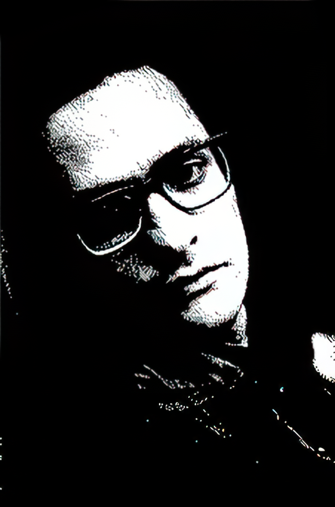 photograph of a man in glasses